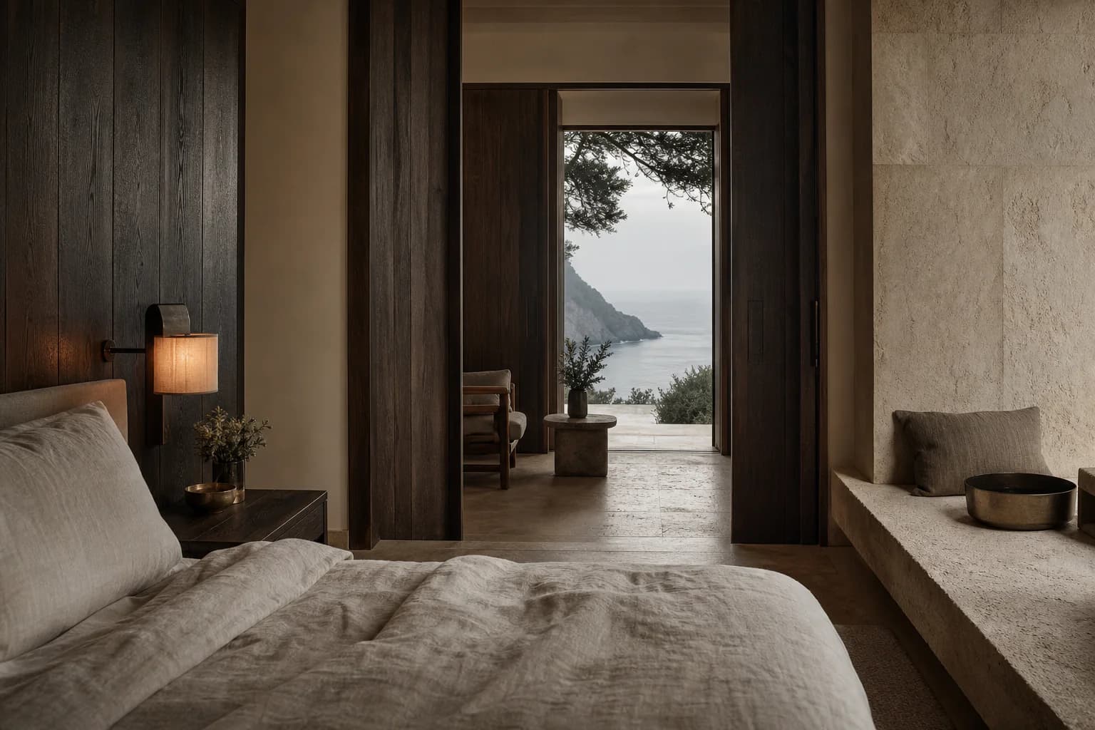 Limestone and dark oak suite facing the sea